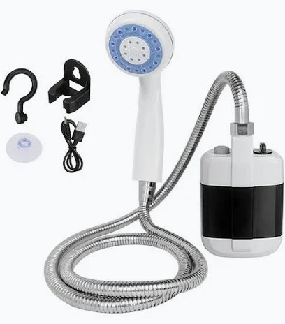 White and black compact portable pump shower with a white handheld shower head with blue face, metallic flexible hose, hook, holder bracket, suction cup and USB cable